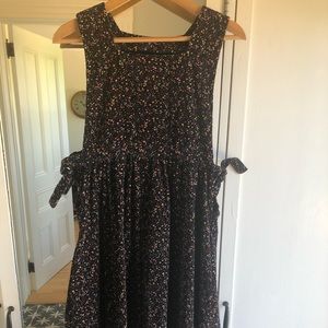 Corduroy dress in small floral material.